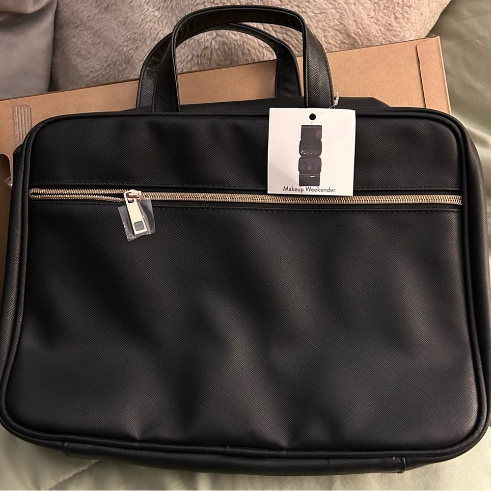 Black Makeup Weekender with gold zippers